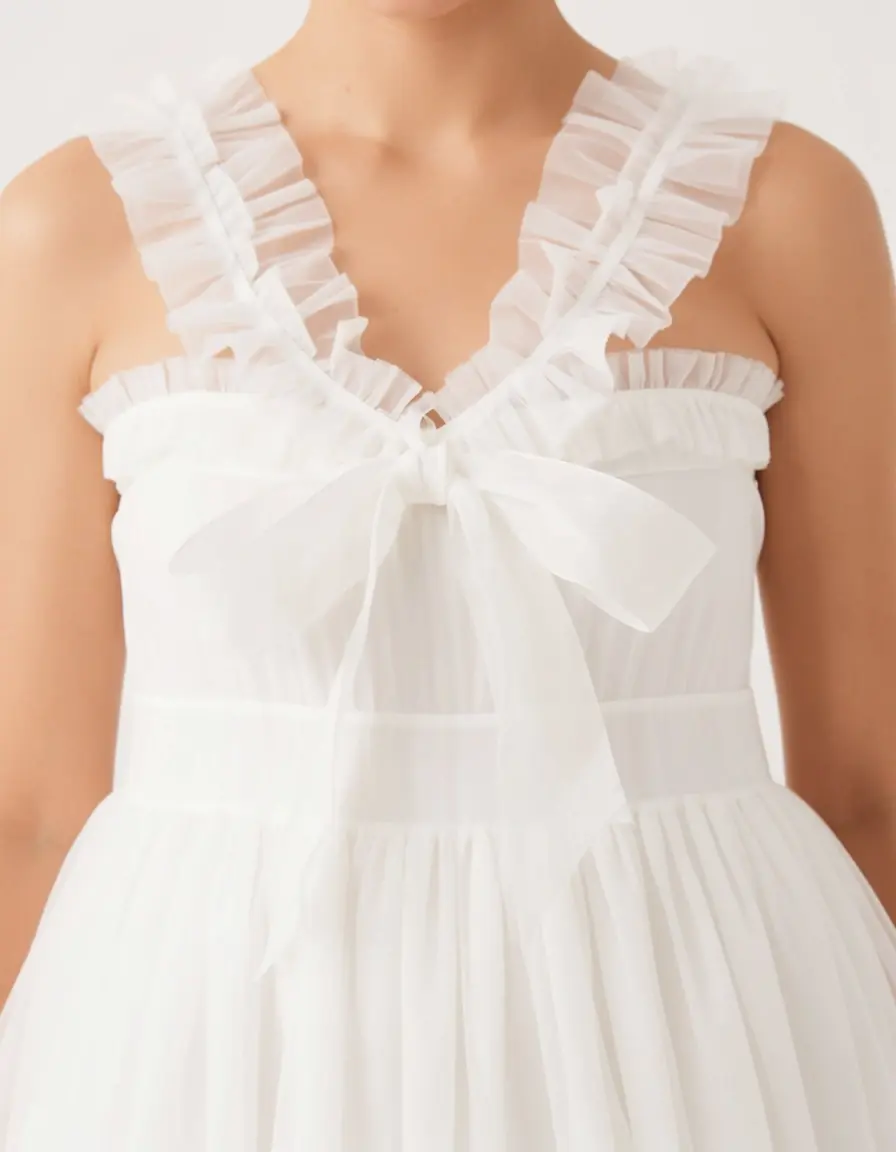 Weißes Organza Kleid mit Schleife und Rüschen